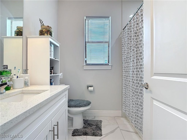 bathroom featuring vanity, baseboards, curtained shower, toilet, and marble finish floor