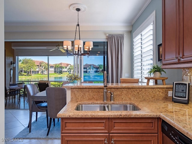 kitchen with tile patterned flooring, crown molding, light stone countertops, dishwasher, and a sink