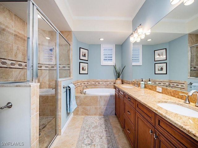 full bath with a sink, a shower stall, and crown molding