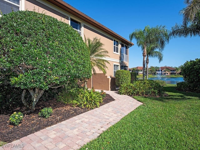 view of yard with a water view