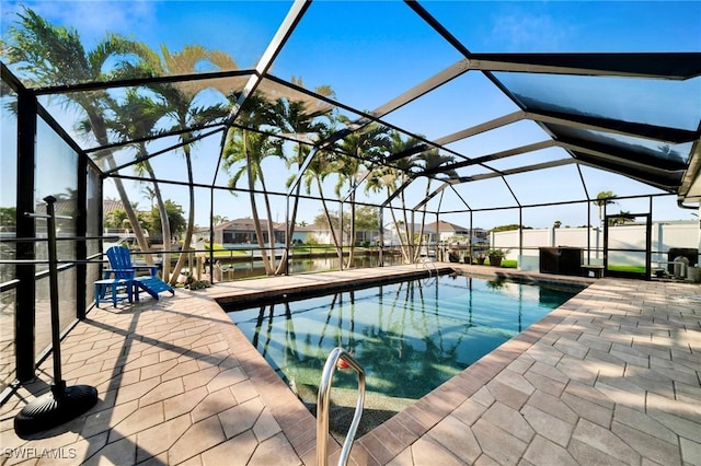 pool with a patio and a lanai