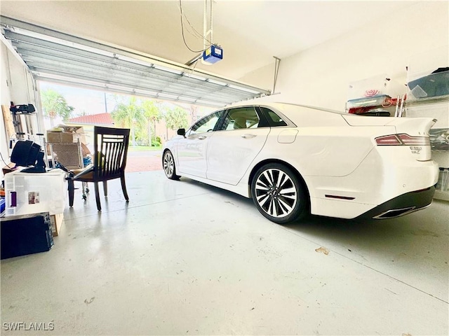 garage featuring a garage door opener