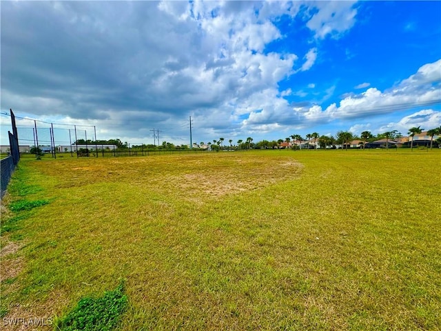 view of yard with fence