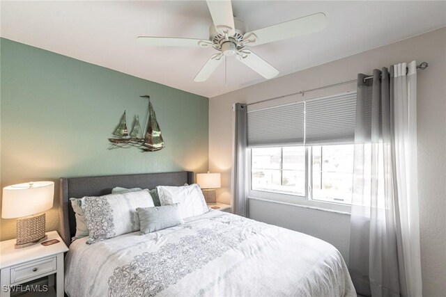 bedroom featuring ceiling fan