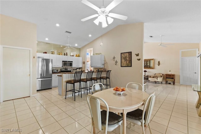 dining room featuring a ceiling fan, recessed lighting, light tile patterned flooring, and visible vents