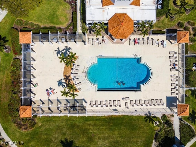 view of pool featuring fence