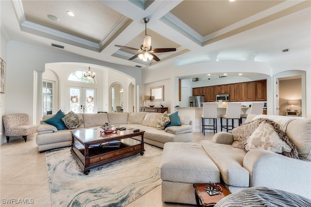 living room featuring arched walkways, french doors, light tile patterned floors, coffered ceiling, and beamed ceiling