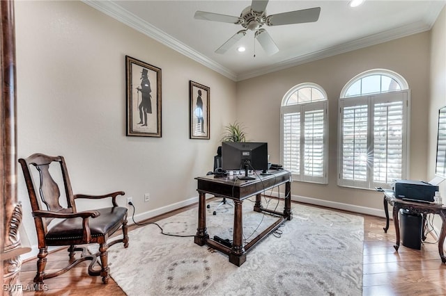 home office featuring ornamental molding, baseboards, and wood finished floors