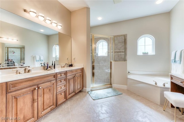 full bathroom with double vanity, a sink, a bath, and a shower stall