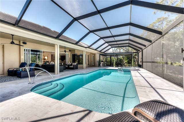 view of swimming pool with a ceiling fan, a patio, a lanai, a pool with connected hot tub, and outdoor lounge area