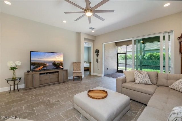 living room featuring visible vents, recessed lighting, baseboards, and ceiling fan