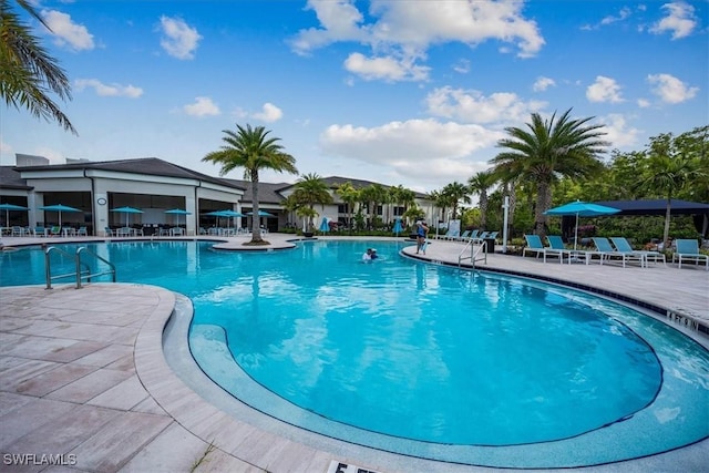 community pool with a patio