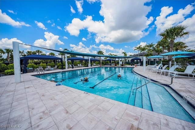 community pool with a patio