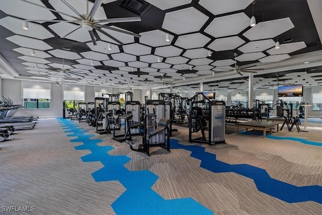 workout area with carpet flooring and ceiling fan