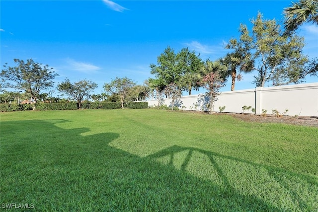 view of yard with fence