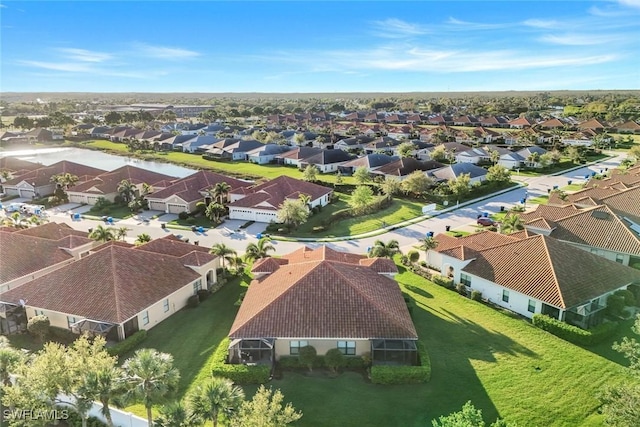 birds eye view of property with a residential view