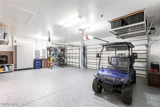 garage featuring a garage door opener