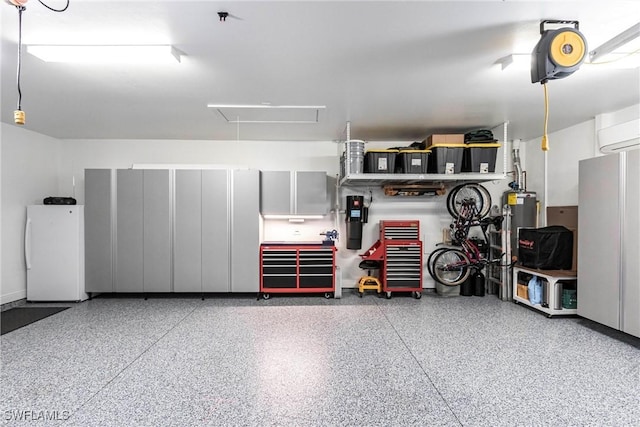 garage with water heater, a garage door opener, and white fridge