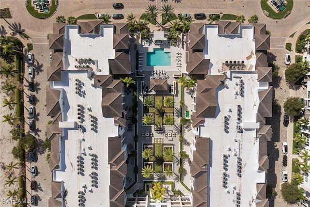 1135 3rd Ave S Unit 317, Naples, FL 34102 - drone / aerial view of a pool area