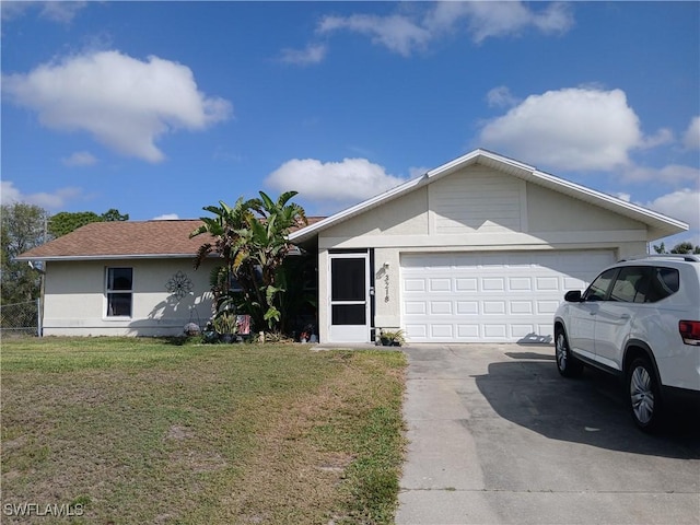 single story home with driveway, an attached garage, a front lawn, and stucco siding