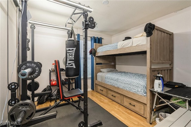 bedroom with wood finished floors