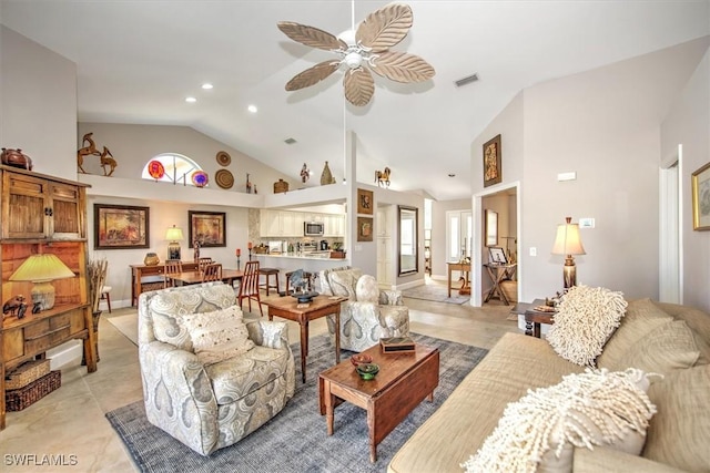 12488 Kelly Pine Ct, Fort Myers, FL 33908 - living area with high vaulted ceiling, plenty of natural light, visible vents, and ceiling fan