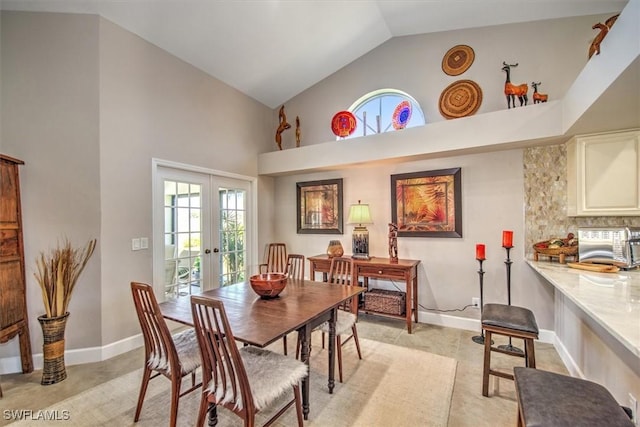 12488 Kelly Pine Ct, Fort Myers, FL 33908 - dining area featuring french doors, baseboards, and high vaulted ceiling