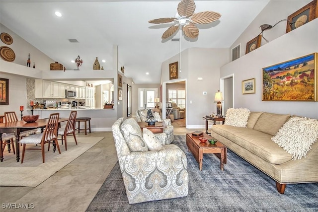 12488 Kelly Pine Ct, Fort Myers, FL 33908 - living area with visible vents, baseboards, high vaulted ceiling, and ceiling fan