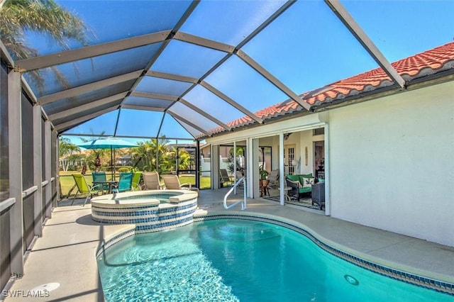 12488 Kelly Pine Ct, Fort Myers, FL 33908 - view of swimming pool featuring a patio area, a lanai, and a pool with connected hot tub