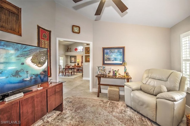 12488 Kelly Pine Ct, Fort Myers, FL 33908 - living area featuring baseboards, a ceiling fan, and vaulted ceiling