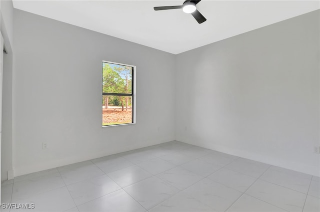 unfurnished room featuring ceiling fan