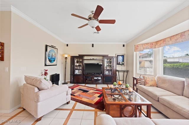 living area featuring baseboards, light tile patterned flooring, and crown molding