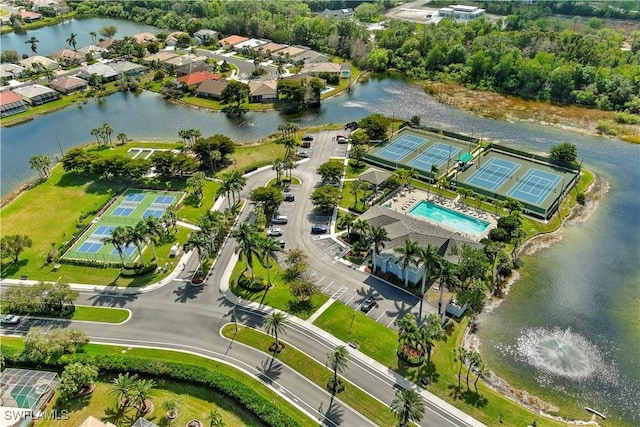 birds eye view of property featuring a water view