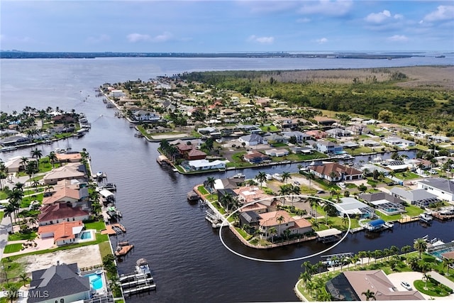 aerial view featuring a residential view and a water view