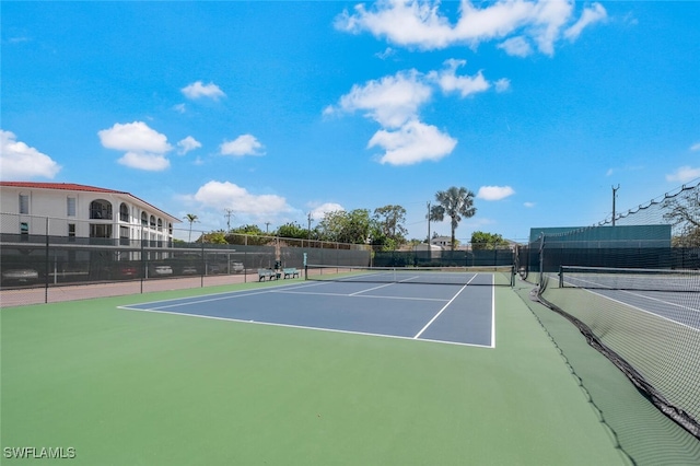 view of sport court featuring fence and community basketball court
