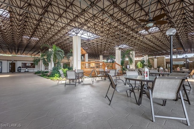 view of patio featuring ceiling fan and outdoor dining space