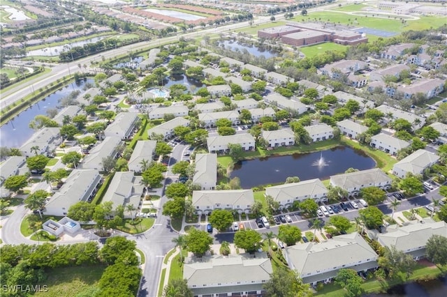 aerial view with a water view and a residential view