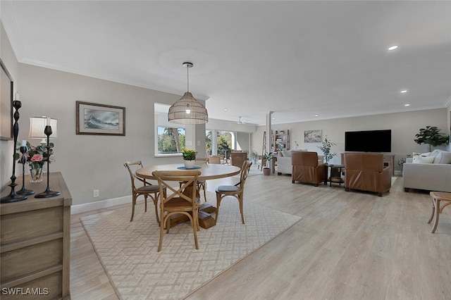 dining space featuring recessed lighting, baseboards, light wood finished floors, and ornamental molding