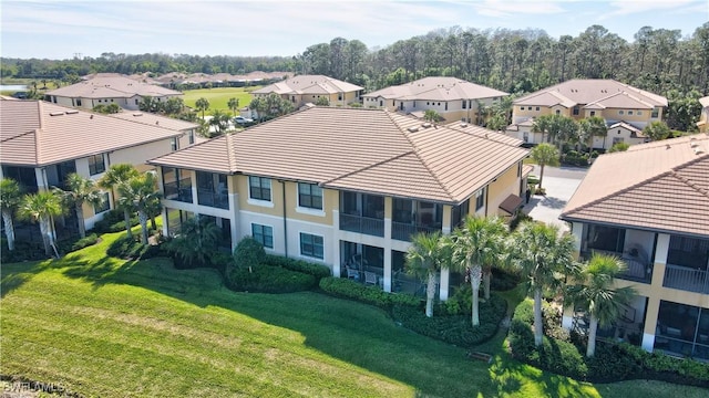 birds eye view of property with a residential view