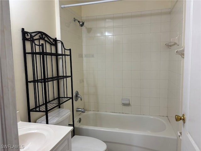 bathroom featuring shower / tub combination, vanity, and toilet