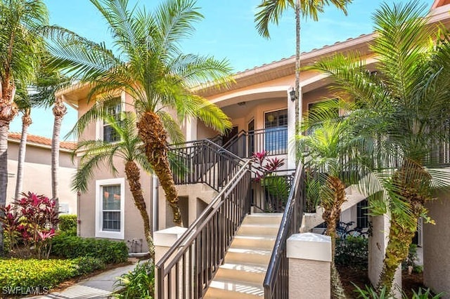 view of property with stairs