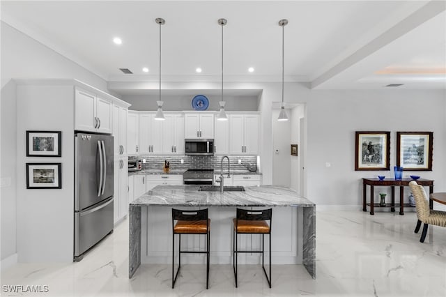 kitchen featuring a sink, white cabinetry, a kitchen breakfast bar, marble finish floor, and appliances with stainless steel finishes