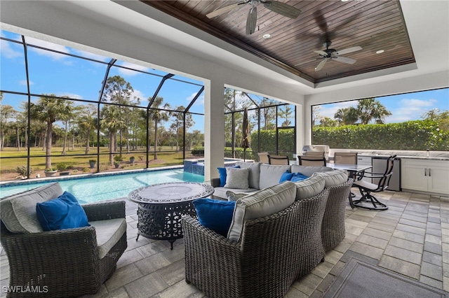 sunroom / solarium featuring a raised ceiling, wooden ceiling, ceiling fan, and a swimming pool