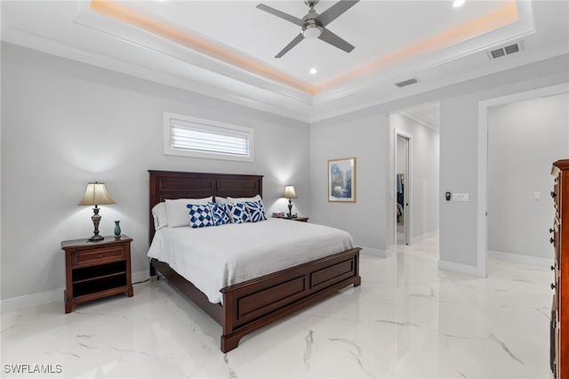 bedroom with marble finish floor, baseboards, visible vents, and a raised ceiling