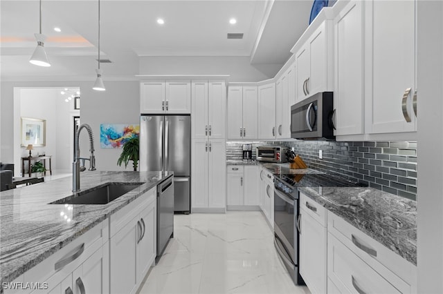 kitchen featuring marble finish floor, stainless steel appliances, visible vents, backsplash, and a sink