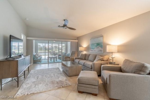 living room featuring a ceiling fan and light tile patterned flooring