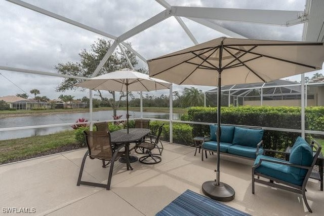 view of patio with a water view, a lanai, and an outdoor living space