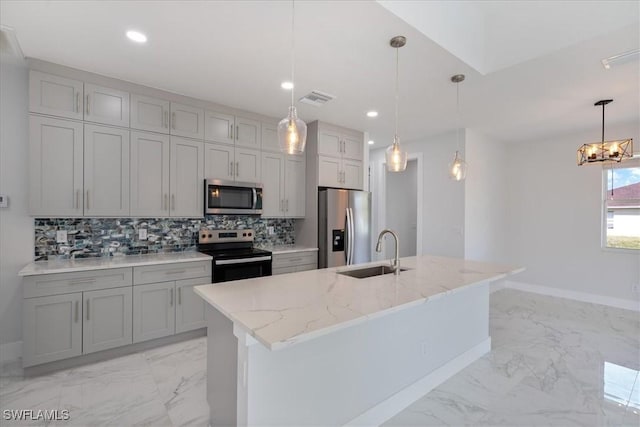 kitchen featuring tasteful backsplash, visible vents, appliances with stainless steel finishes, marble finish floor, and a sink