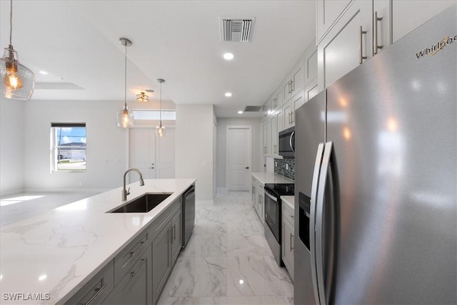 kitchen featuring marble finish floor, recessed lighting, visible vents, a sink, and black appliances