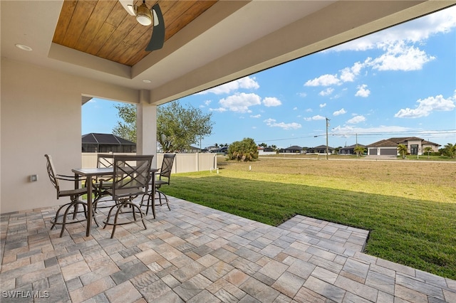 view of patio / terrace featuring outdoor dining area and a ceiling fan